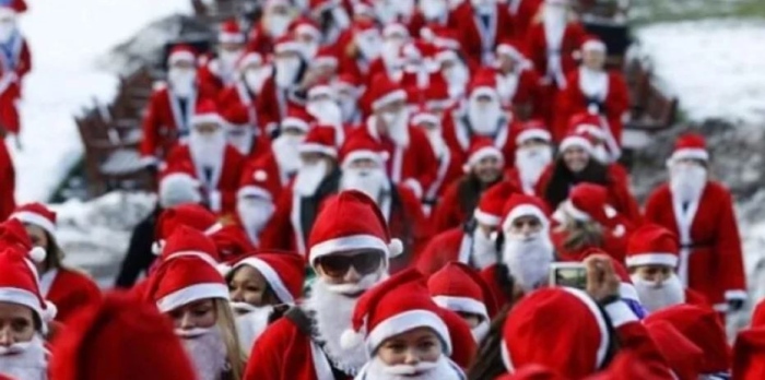 Хиляди хора, облечени като Дядо Коледа, участваха в благотворителна кампания в Мадрид