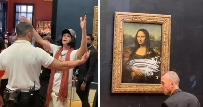 Мъж замери Мона Лиза с торта (ВИДЕО)